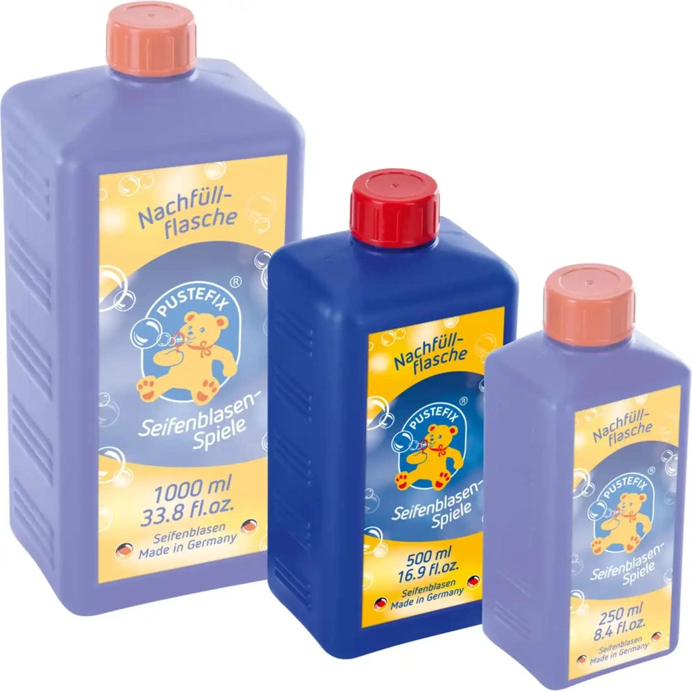 PUSTEFIX Professional Soap Bubble Liquid Refill bottles with red caps, glossy labels, and colorful text, displayed on a white