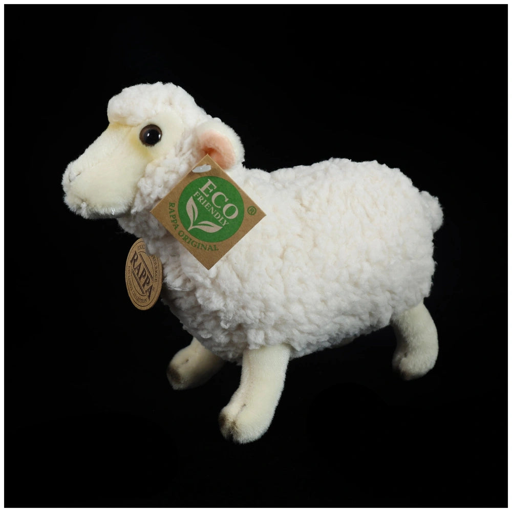 Plush sheep stuffed animal in white with fluffy texture, featuring an eco-friendly tag with a green leaf logo.