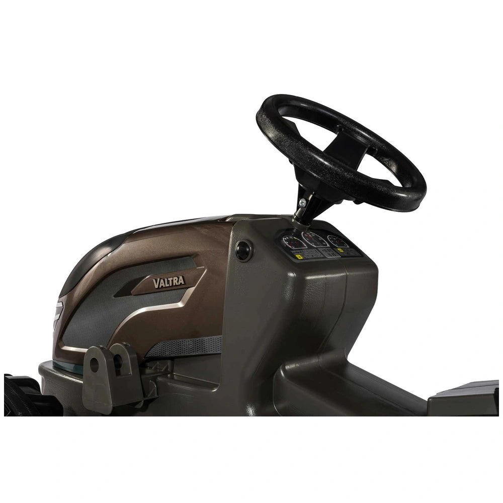 ROLLEY TOYS rollyFarmtrac Premium II Valtra is a black riding toy with a control panel and steering wheel-like handle.