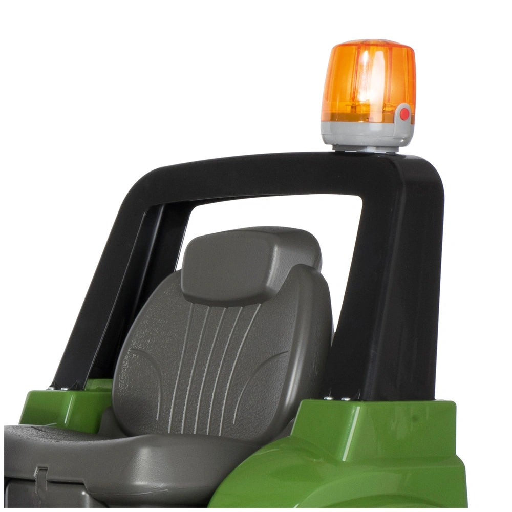 Rollyflashlight accessory in orange displayed on a grey upholstered vehicle seat with a black plastic frame.