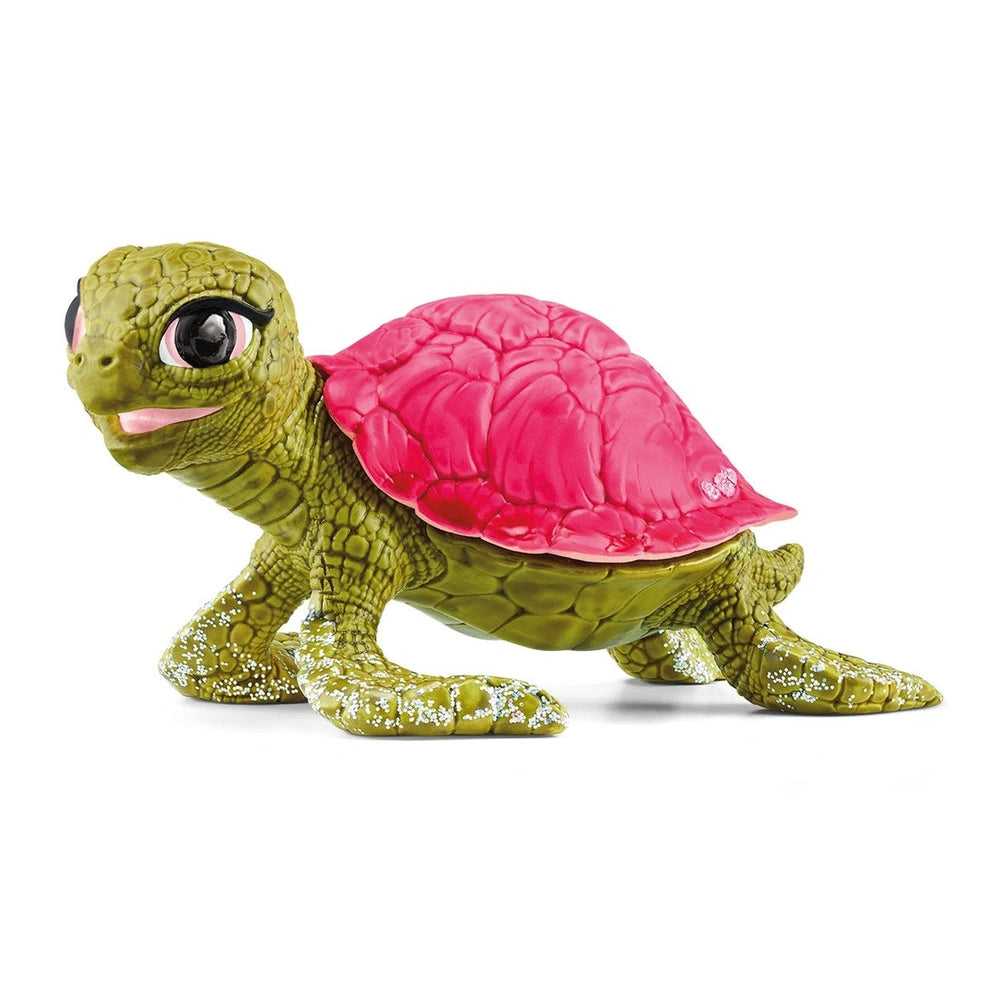 Bright pink shell turtle with a green body, glossy finish, and detailed features, positioned against a light background.