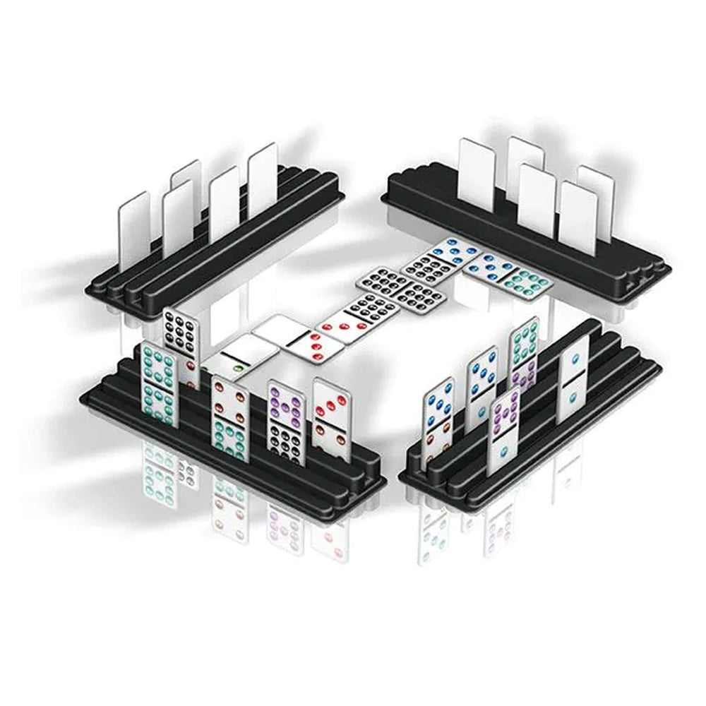 Black dominoes with white pips arranged in a pattern on a reflective surface.