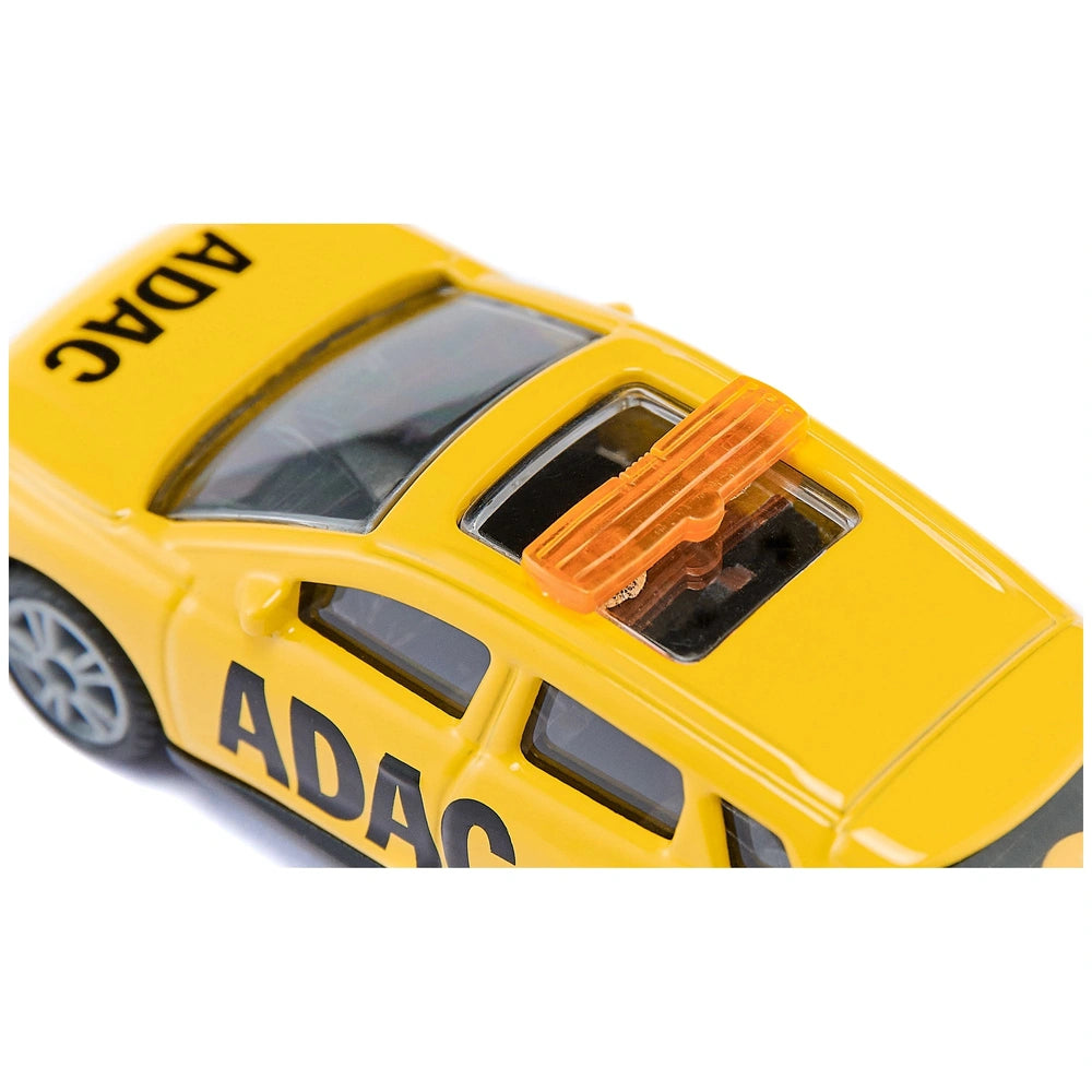 Bright yellow toy car with a glossy finish, featuring "ADAC" text on the side against a white background.