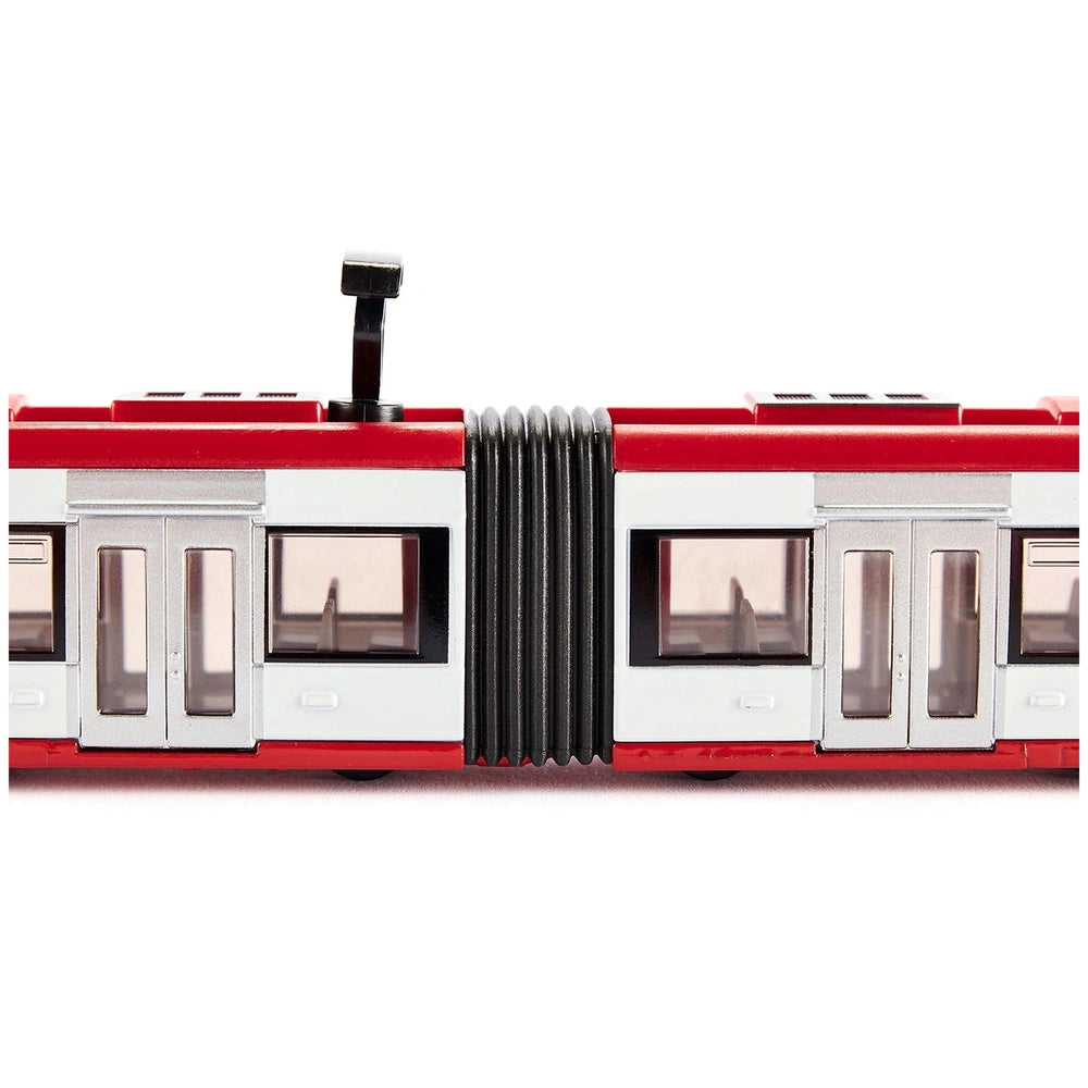 Siku Bombardier Tram model features a red and white plastic design with clear windows and a central coupling mechanism.
