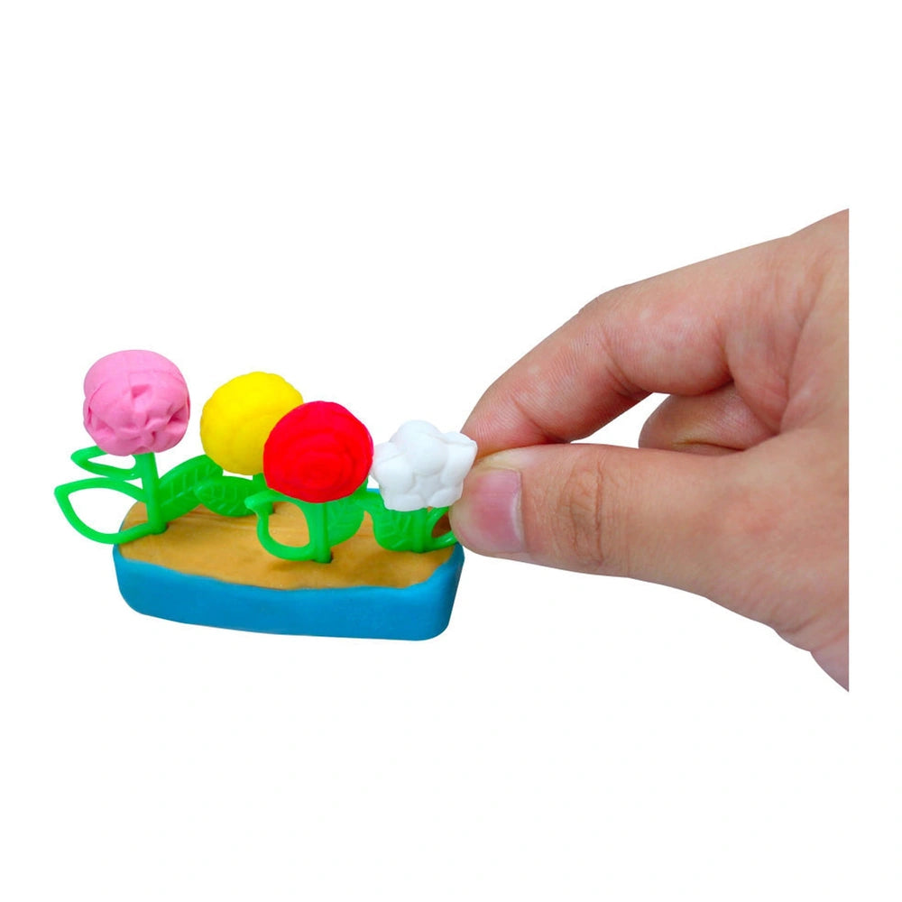 Simba Art & Fun Unicorn Clay Set showcasing a colorful flower model held by a hand against a plain white background.