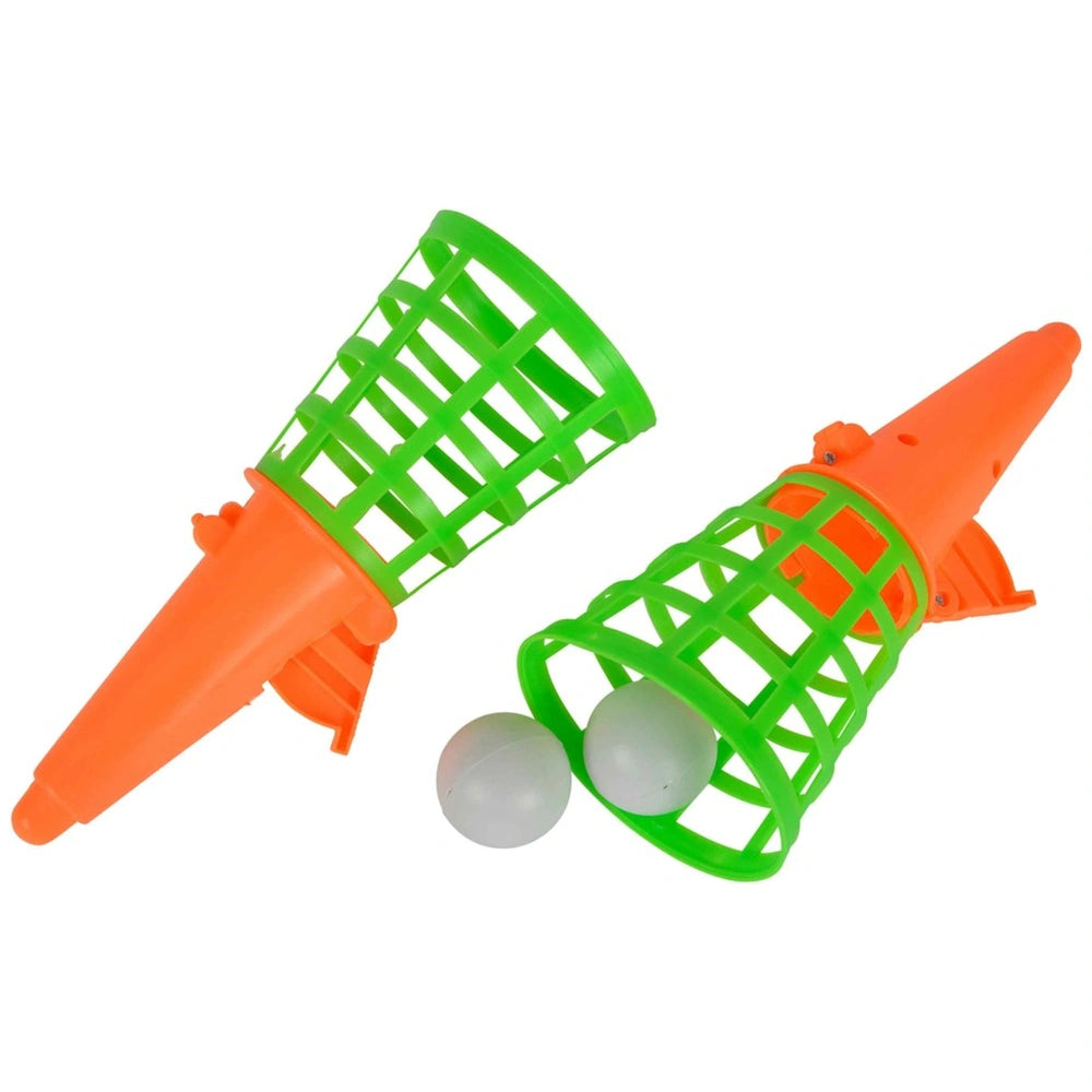 Simba Catchball game set featuring two orange cones with green flexible tops, designed for outdoor play.