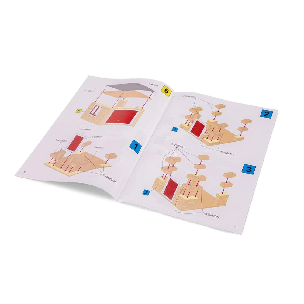 Teifoc Fire Station manual displays colorful diagrams of building components and instructions for assembly.