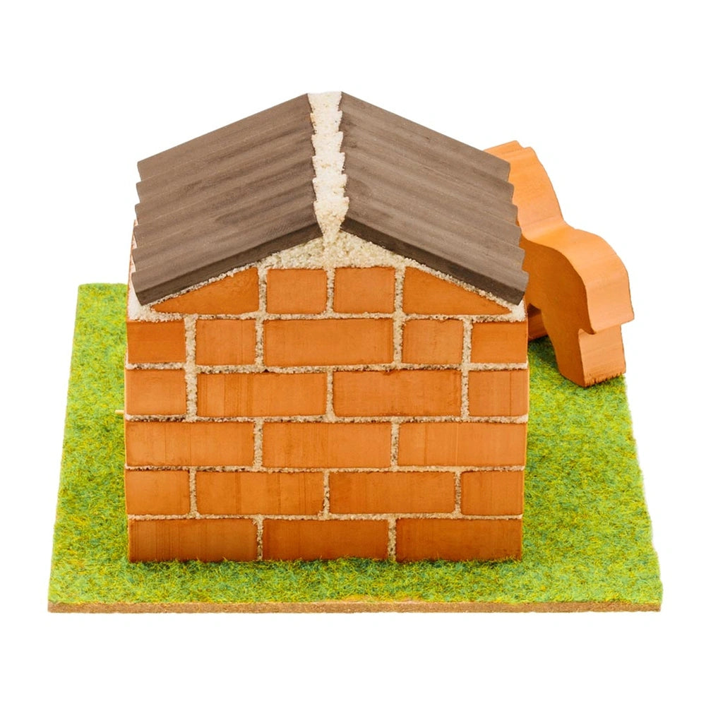 Teifoc little horse stable model features a brick facade, shingled roof, and green base, showcasing vibrant colors and textur