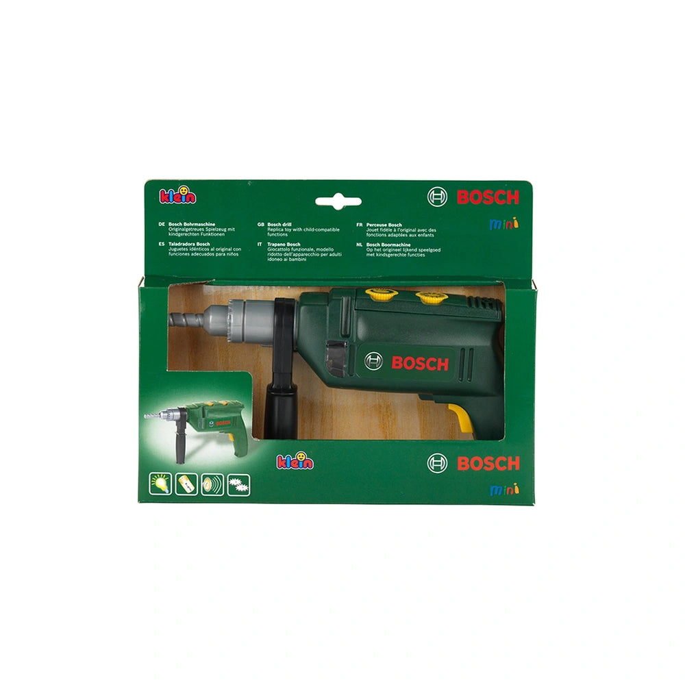 Theo Klein Bosch mini cordless drill in green and black with transparent window, displayed on white background packaging.