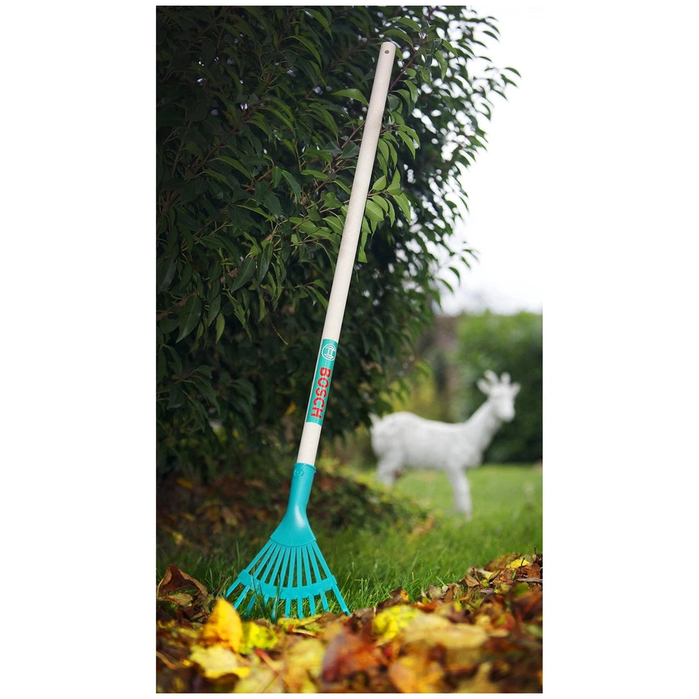 Theo Klein Bosch Garden greenery rake with a blue plastic head and white textured handle, designed for outdoor play.