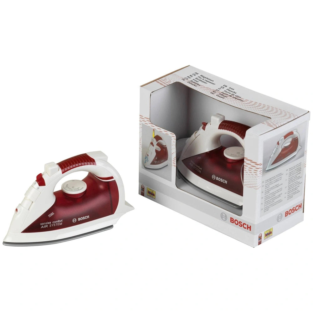 Red and white Bosch iron with "AIR SYSTEM" and "1200" text, packaged in a white cardboard box featuring logos.