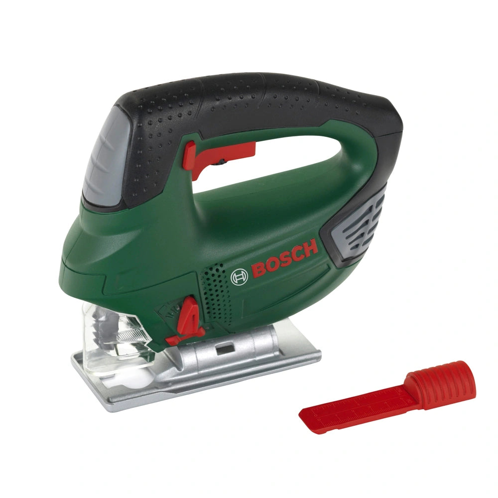Theo Klein Bosch jigsaw with green plastic body, black textured handle, red blade, and visible "BOSS" branding.