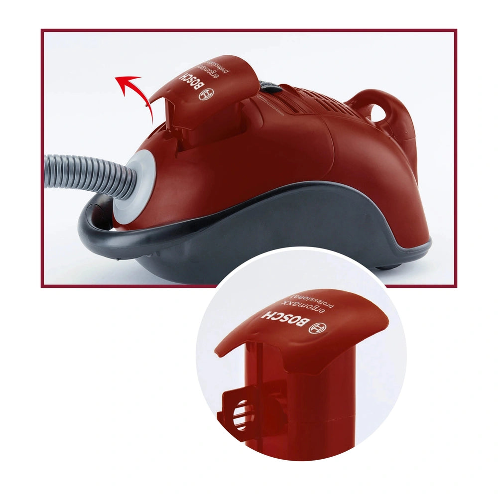 Theo Klein Bosch red vacuum cleaner made of glossy plastic with hose attachment, trigger handle, and front nozzle.
