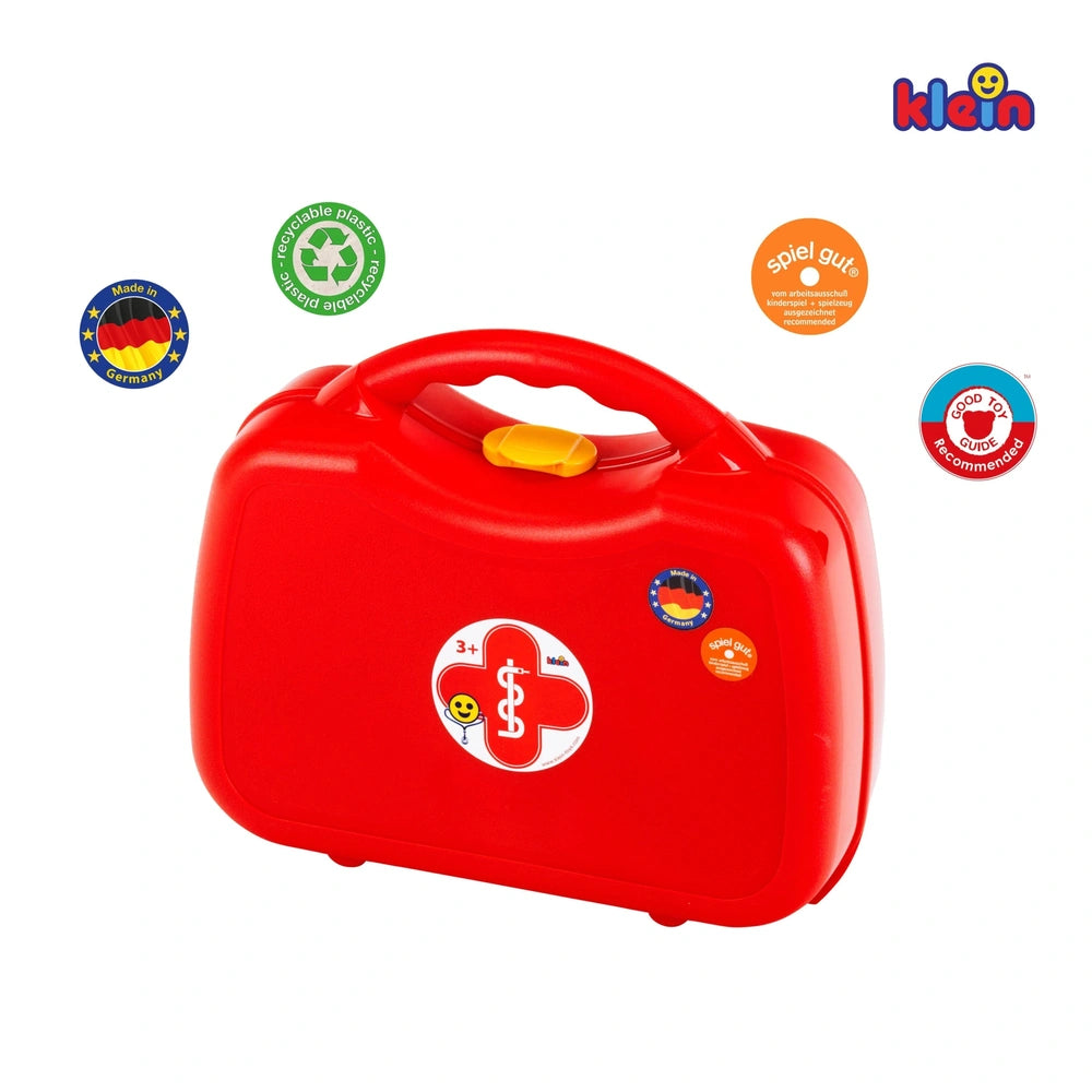 Red doctor case with a glossy finish, featuring colorful stickers and a yellow button, ideal for pretend play.