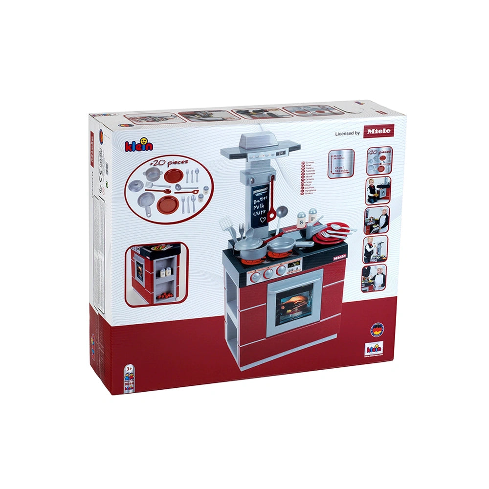 Theo Klein Miele Kitchen Compact toy in red and white cardboard packaging with plastic window and printed text and symbols.